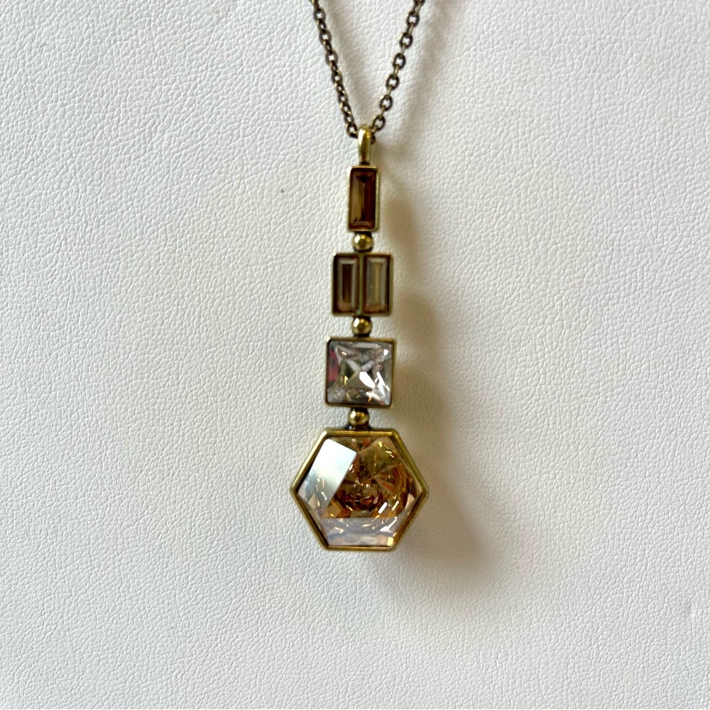 Touchstone Crystal Gold and Silver Necklace with Geometric Charms